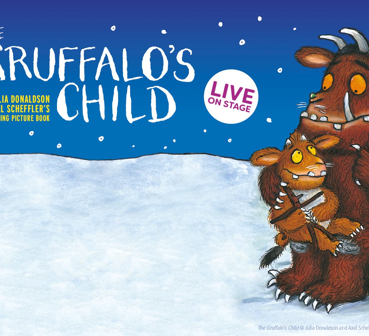 The gruffalo cuddles its child in the snow