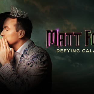 Man dressed like the characters from Wicked