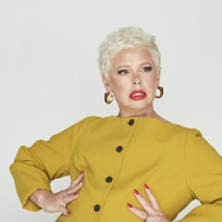 Blonde woman in yellow coat