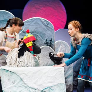 Actor with a yak puppet