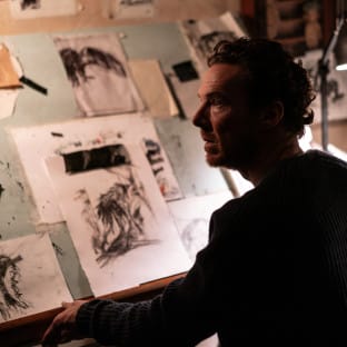 Man at drawing table