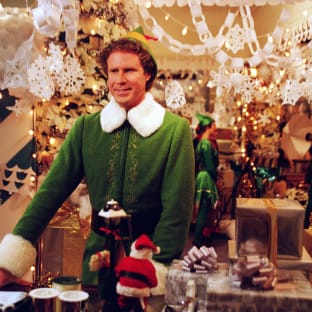 Man dressed like a Christmas elf in a Christmas shop