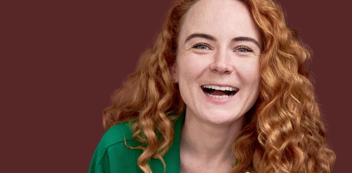 Ginger woman laughing