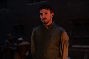 Man lit by orange light