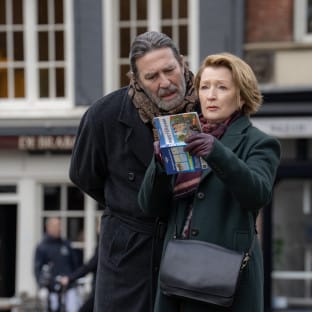 Two people looking at map