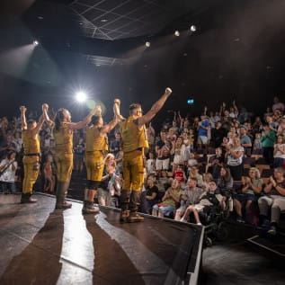 Stage performers taking a bow
